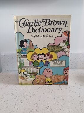 The Charlie Brown Dictionary by Charles M. Schulz - Illustrated Cover